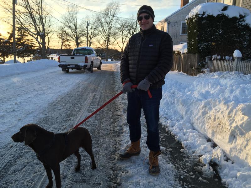 Jim Wheeler and his dog Annie out for a walk after the storm. "We walked everywhere yesterday," he said. "The roads were treacherous." BY GEORGIA SPARLING